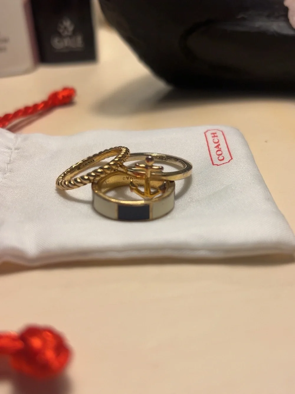 Coach Stackable Ring Trio with Gold Anchor, Rope, and Navy and Cream Inlay bands